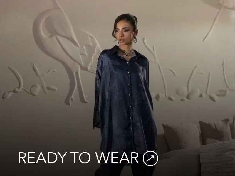 Green embroidered outfit styled in a warm indoor setting; Nainpreet’s “Ready to Wear” text sits below on the banner.