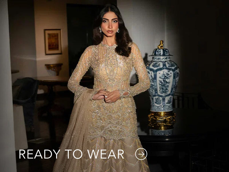 Green embroidered outfit styled in a warm indoor setting; Nainpreet’s “Ready to Wear” text sits below on the banner.