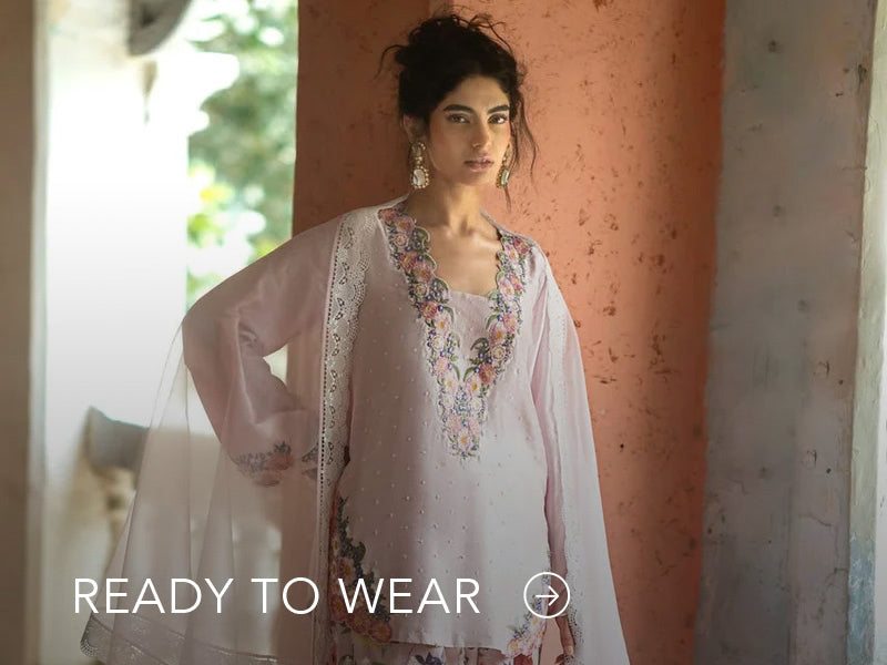 Green embroidered outfit styled in a warm indoor setting; Nainpreet’s “Ready to Wear” text sits below on the banner.