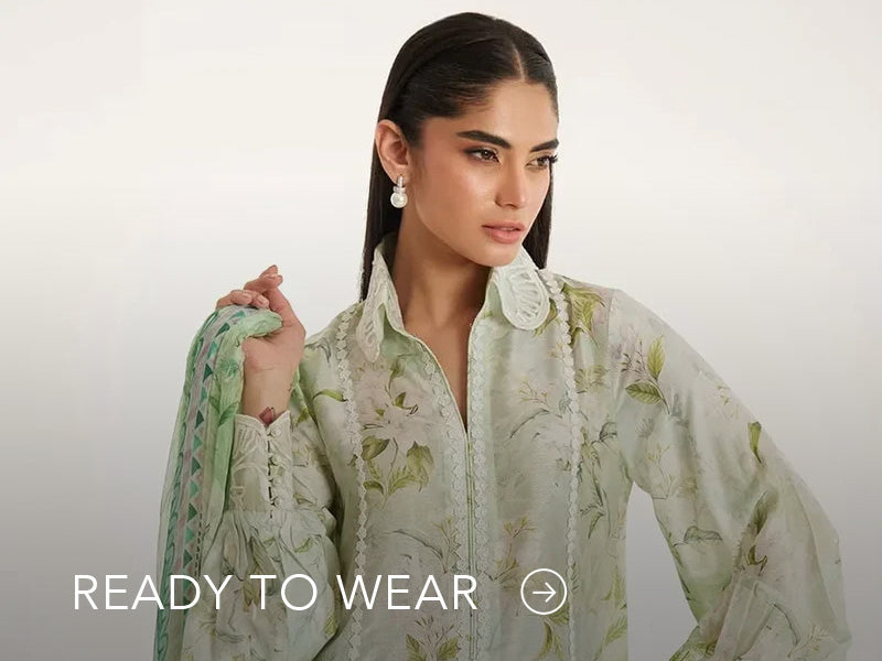 Green embroidered outfit styled in a warm indoor setting; Nainpreet’s “Ready to Wear” text sits below on the banner.
