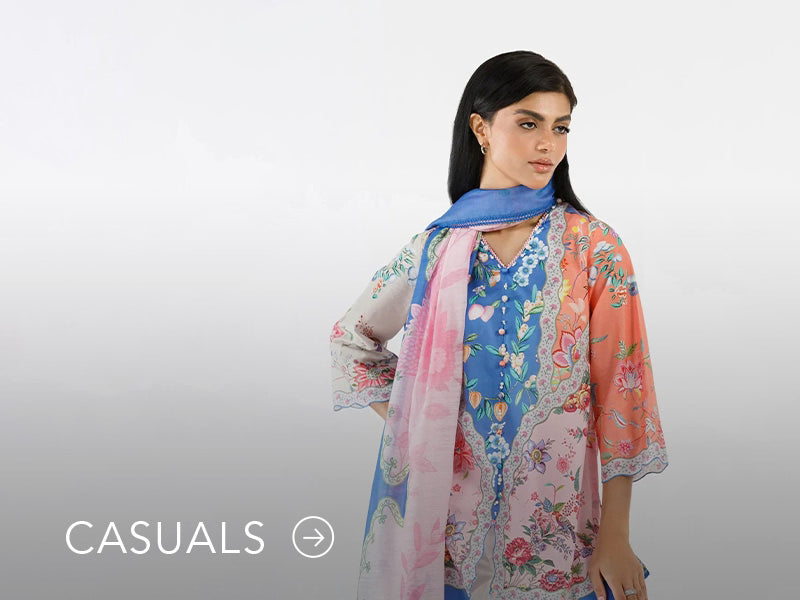 Model in a light blue casual kurta with floral and geometric prints; “Casuals” text below on Nainpreet’s banner..