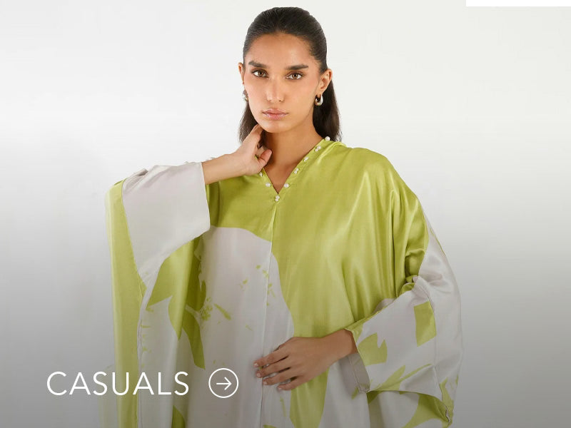 Model in a light blue casual kurta with floral and geometric prints; “Casuals” text below on Nainpreet’s banner..