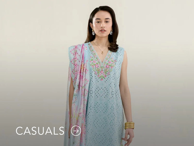Model in a light blue casual kurta with floral and geometric prints; “Casuals” text below on Nainpreet’s banner..