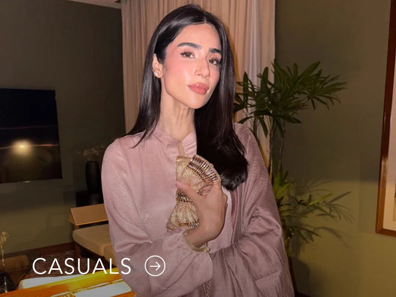 Model in a light blue casual kurta with floral and geometric prints; “Casuals” text below on Nainpreet’s banner..