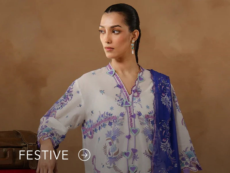 A banner for the festive collection on Nainpreet, featuring embroidered velvet and celebratory accents.