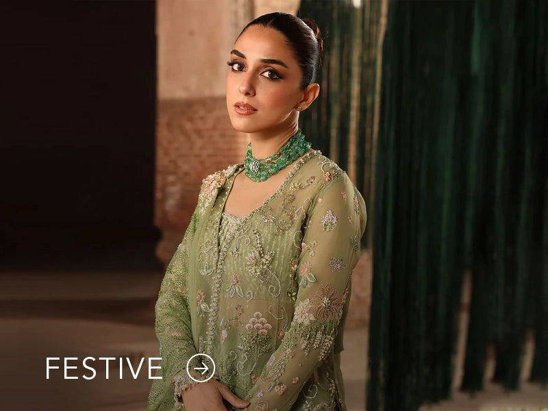 A banner for the festive collection on Nainpreet, featuring embroidered velvet and celebratory accents.