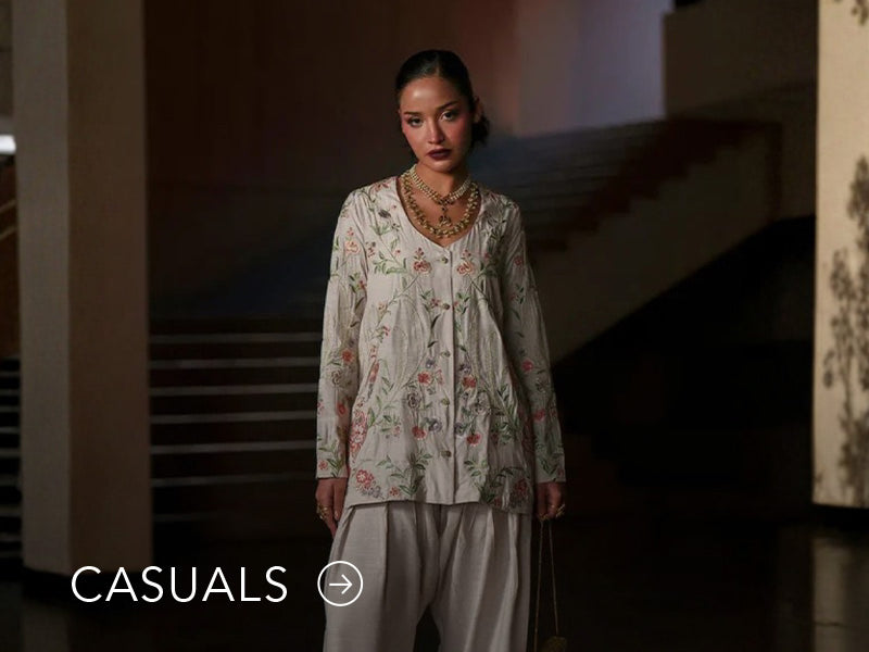 Model in a light blue casual kurta with floral and geometric prints; “Casuals” text below on Nainpreet’s banner..