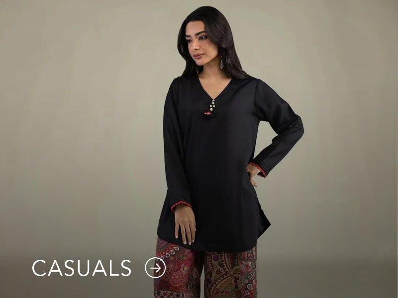 Model in a light blue casual kurta with floral and geometric prints; “Casuals” text below on Nainpreet’s banner..