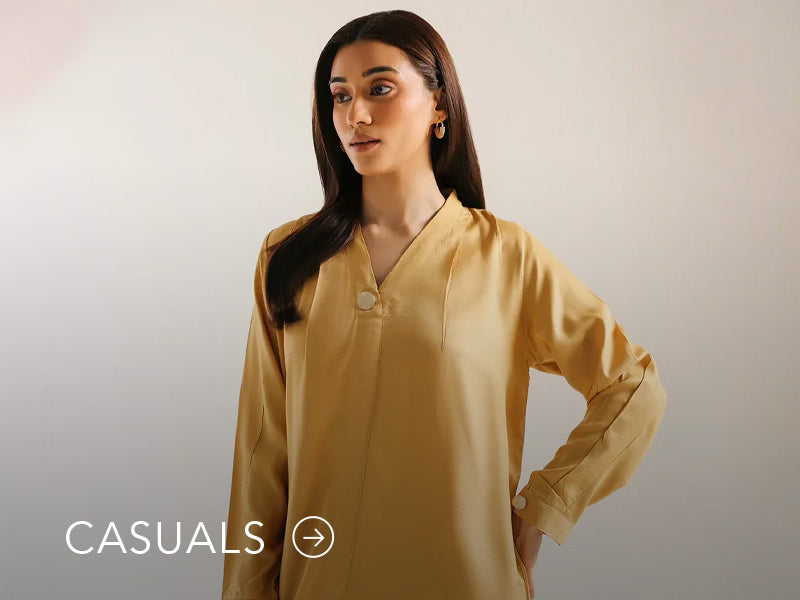Model in a light blue casual kurta with floral and geometric prints; “Casuals” text below on Nainpreet’s banner..