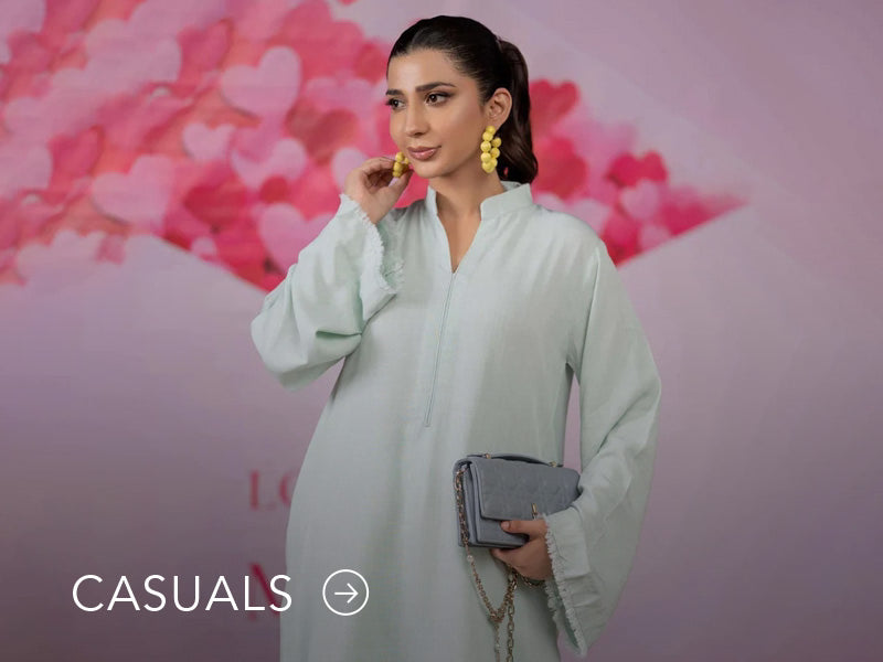 Model in a light blue casual kurta with floral and geometric prints; “Casuals” text below on Nainpreet’s banner..