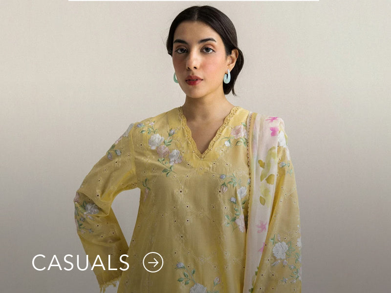 Model in a light blue casual kurta with floral and geometric prints; “Casuals” text below on Nainpreet’s banner..