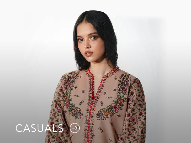 Model in a light blue casual kurta with floral and geometric prints; “Casuals” text below on Nainpreet’s banner..