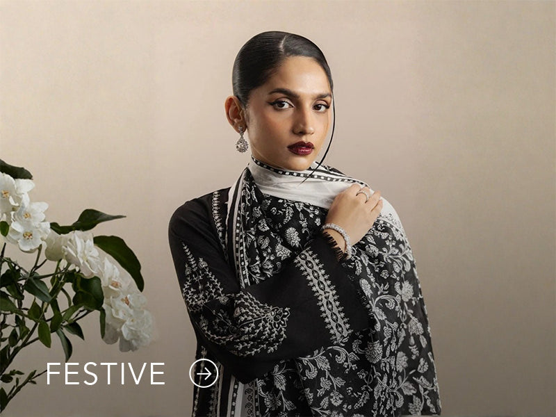 A banner for the festive collection on Nainpreet, featuring embroidered velvet and celebratory accents.