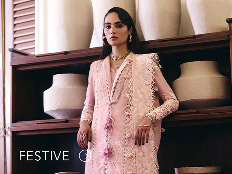 A banner for the festive collection on Nainpreet, featuring embroidered velvet and celebratory accents.