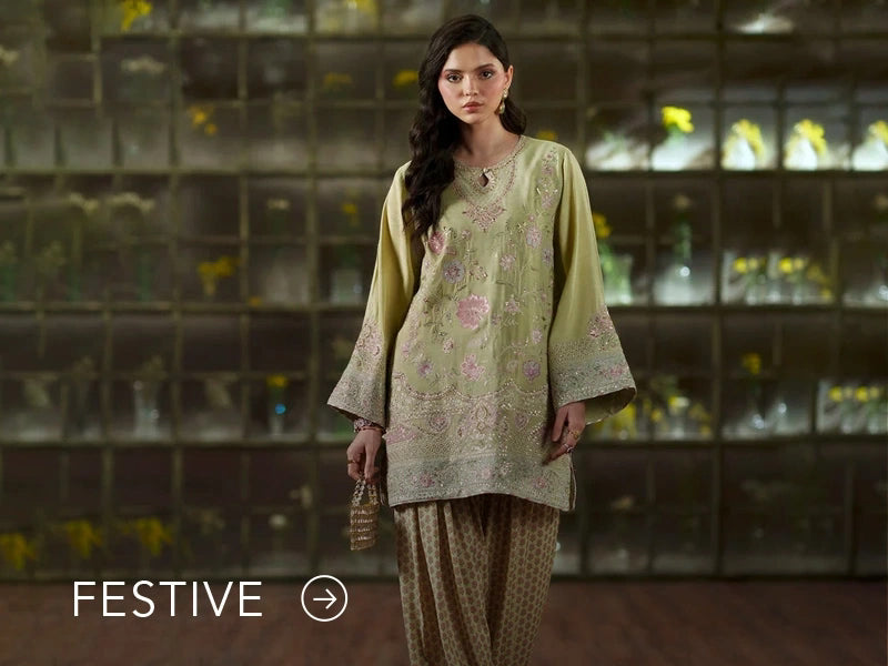 A banner for the festive collection on Nainpreet, featuring embroidered velvet and celebratory accents.