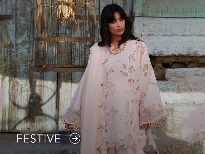 A banner for the festive collection on Nainpreet, featuring embroidered velvet and celebratory accents.