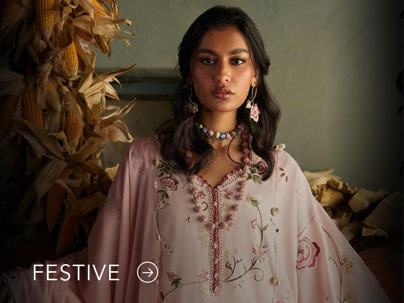 A banner for the festive collection on Nainpreet, featuring embroidered velvet and celebratory accents.