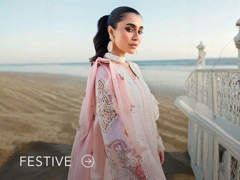 A banner for the festive collection on Nainpreet, featuring embroidered velvet and celebratory accents.