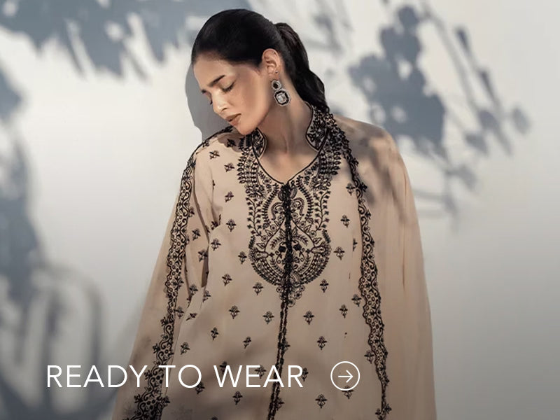 Green embroidered outfit styled in a warm indoor setting; Nainpreet’s “Ready to Wear” text sits below on the banner.