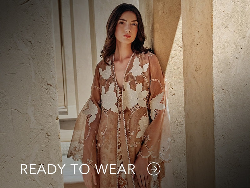 Green embroidered outfit styled in a warm indoor setting; Nainpreet’s “Ready to Wear” text sits below on the banner.