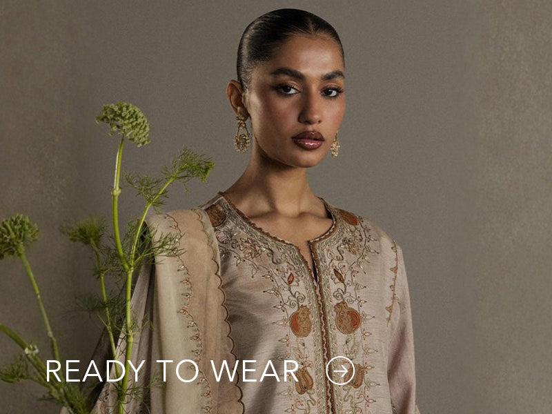 Green embroidered outfit styled in a warm indoor setting; Nainpreet’s “Ready to Wear” text sits below on the banner.