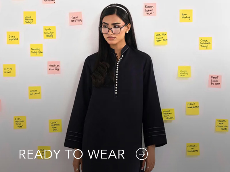 Green embroidered outfit styled in a warm indoor setting; Nainpreet’s “Ready to Wear” text sits below on the banner.