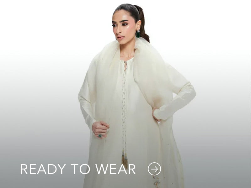 Green embroidered outfit styled in a warm indoor setting; Nainpreet’s “Ready to Wear” text sits below on the banner.