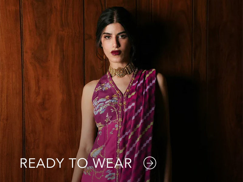Green embroidered outfit styled in a warm indoor setting; Nainpreet’s “Ready to Wear” text sits below on the banner.