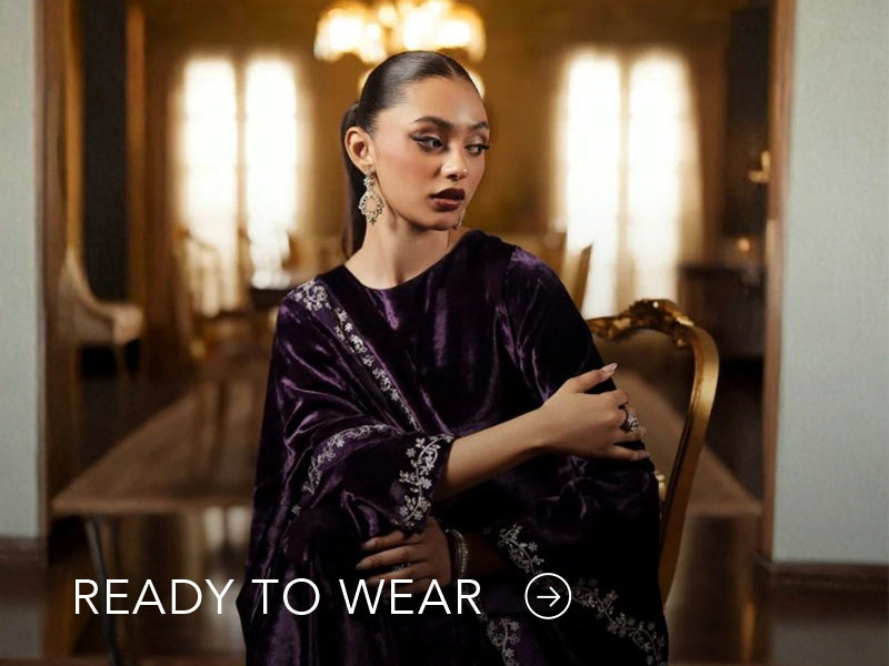 Green embroidered outfit styled in a warm indoor setting; Nainpreet’s “Ready to Wear” text sits below on the banner.