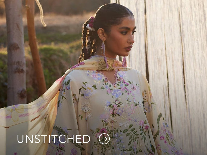 A banner on Nainpreet featuring embroidered unstitched ensembles with vibrant detailing and soft contrast.