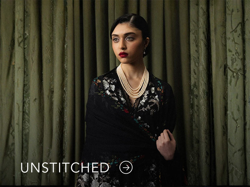 A banner on Nainpreet featuring embroidered unstitched ensembles with vibrant detailing and soft contrast.