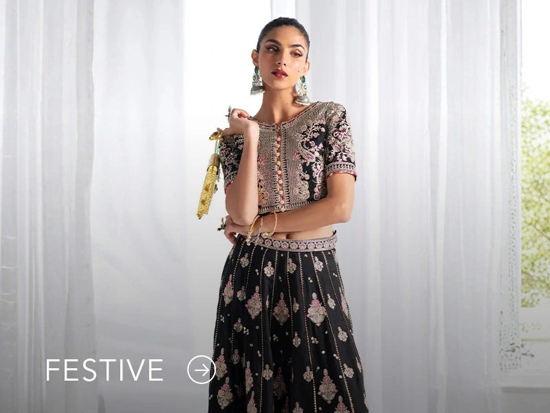 A banner for the festive collection on Nainpreet, featuring embroidered velvet and celebratory accents.