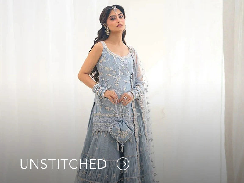 A banner on Nainpreet featuring embroidered unstitched ensembles with vibrant detailing and soft contrast.